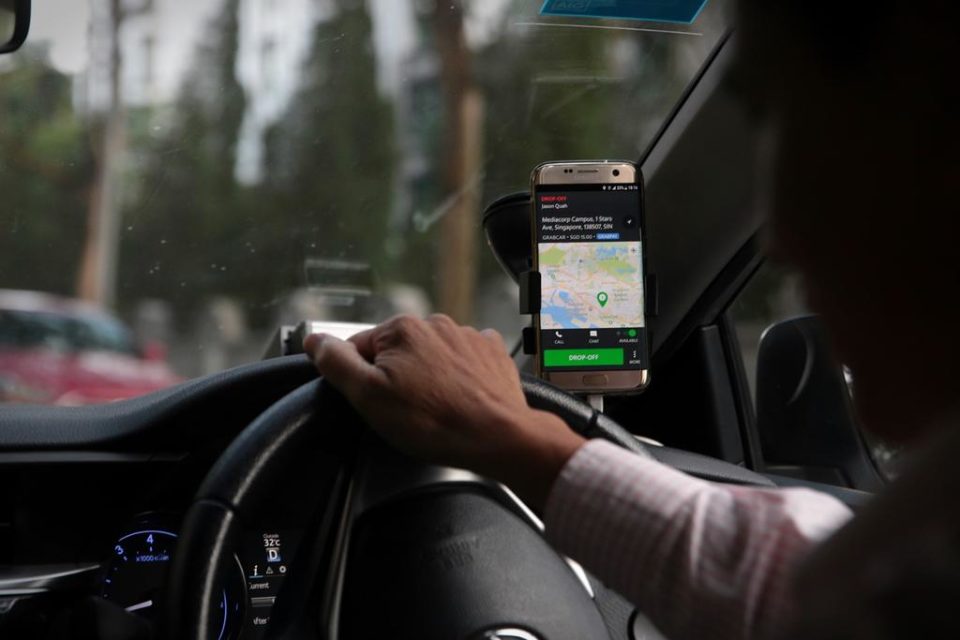 Grab allows passengers front seat