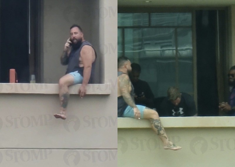 Man seen sitting on ledge of Clarke Quay hotel room