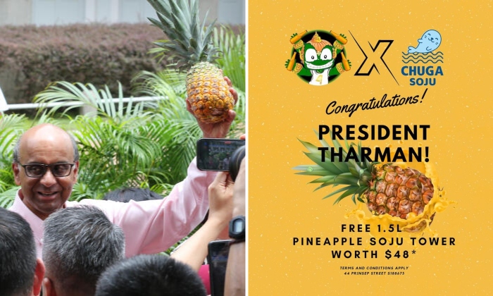 offers free pineapple soju wearing pineapple Prinsep Street Tharman Shanmugaratnam